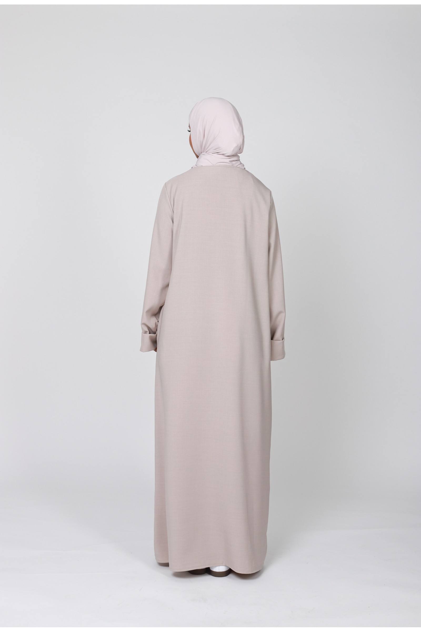 Legislated beige abayas for Muslim women 2024
