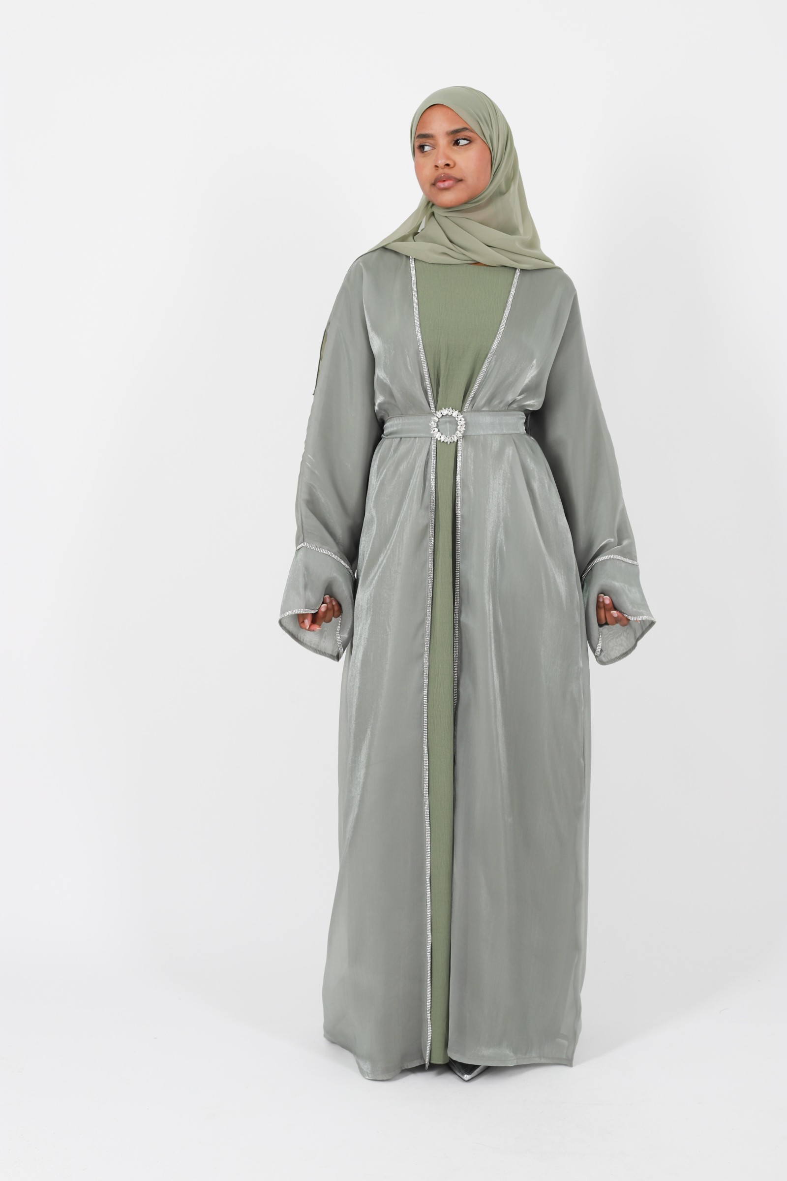 Abaya Dubai modern Muslim woman outfit aid el fitr 2024